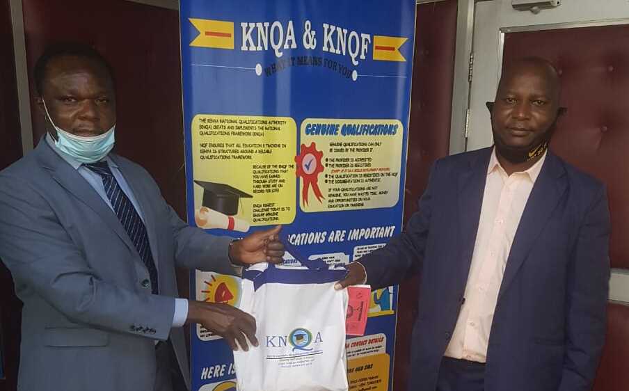 The KNQA Director General Dr Juma Mukhwana and Absolom Mogoka, Chair of the Kenya Vocational Trainers Association after discussing about how to Revamp Vocational and Technical Training in Kenya