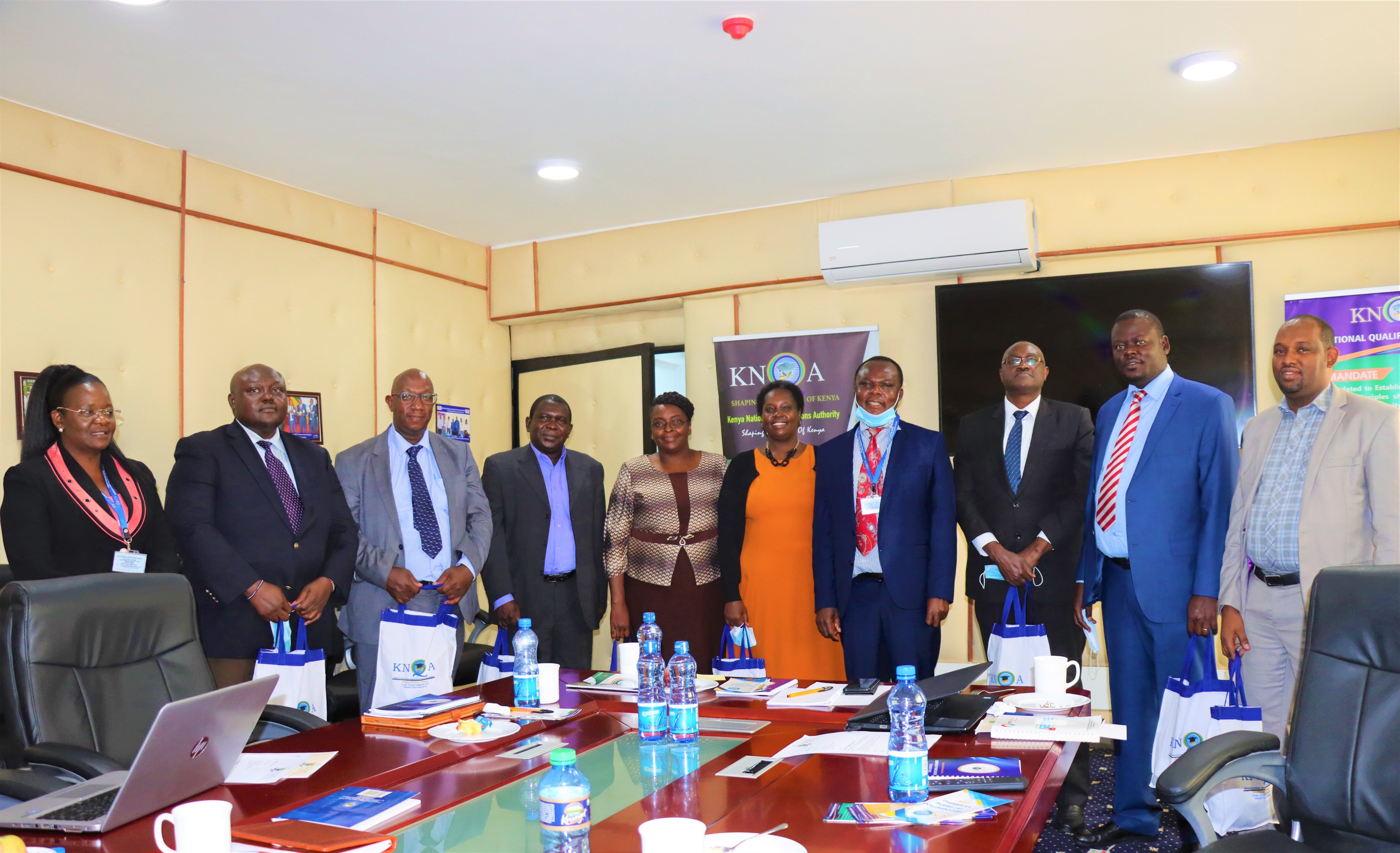 KNQA senior management officers and HRMPEB board members in a meeting to review Human Resource Curricular in the country to align it to the KNQF.