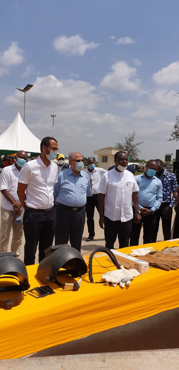 KNQA CEO Dr. Juma Mukhwana accompanies Dr. Mohammed Jaffer, Chairperson Africa Oil and Gas Company in officiating the graduation of 124 scaffolders trained by Toolkit TTI in Miritini, Mombasa