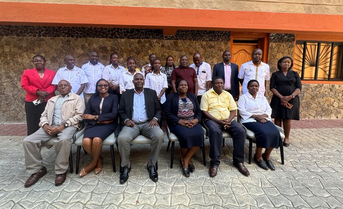 KNQA Council Chairperson Hon. Stanley Kiptis with Ag. Director General Dr. Alice Kande in a group photo alongside members of the Technical Working Committee for the development of the National Policy Framework for Accreditation System on Qualifications.