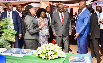 Prime Cabinet Secretary Hon. Musalia Mudavadi, CS Education Hon. Ezekiel Machogu and KNQA Director General Dr. Alice Kande at the KNQA exhibition booth during the opening ceremony of the 6th PASET Annual Conference.